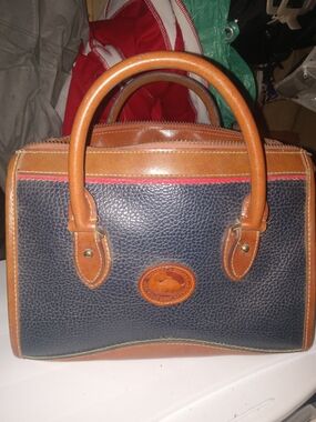 Dooney & Bourke Navy Pebbled Leather Satchel with Tan Trim and Red Accent